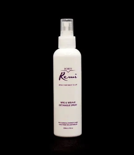 A bottle of BOBOS Remi Wig & Weave Detangle Spray 6.76 oz on a black background.