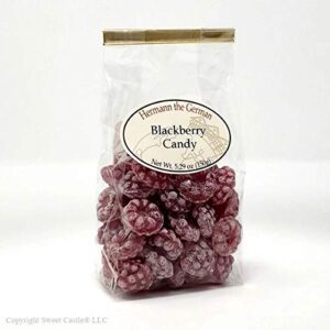 A bag of Hermann the German Blackberry Candy on a white surface.