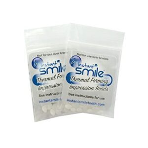 Two bags of Billy Bob Replacement Thermal Adhesive Fitting Beads for Fake Teeth Package of 2 dental impressions.