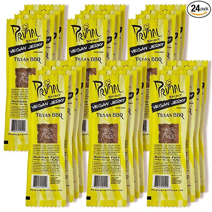 A pack of Primal Spirit Vegan Jerky – “Classic Flavor” – Texas BBQ, 10 g. Plant Based Protein, Certified Non-GMO, No Preservatives, Sports Friendly Packaging (24 Pack, 1 oz) on a white background.