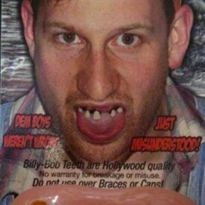 A picture of a man with Billy Bob 10031 Deliverance Fake Teeth Novelty Item in a magazine.