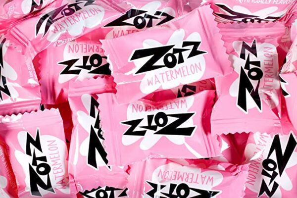A pile of Zotz Fizz Power Candy Watermelon - Fruit Flavored Hard Candy with a Fizzy Center | 230g Bag, Single Pack | Gluten-Free candy wrappers.