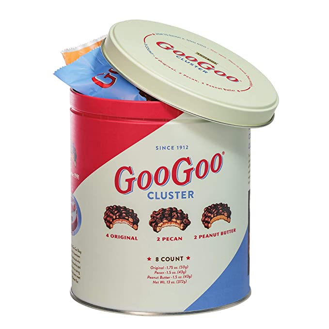 A Goo Goo Cluster Assorted Collectors Tin in a white tin.