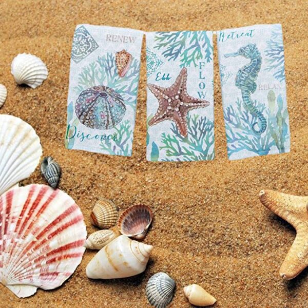 Kay Dee Designs Set of 3 Beachcomber Dual Purpose Terry Kitchen Towels, seahorses, starfish and Kay Dee Designs Set of 3 Beachcomber Dual Purpose Terry Kitchen Towels on the sand.